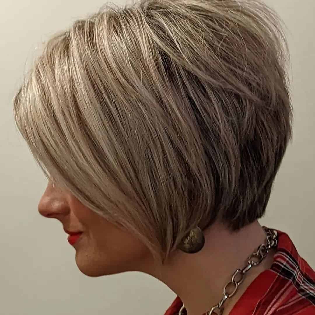 268978800_1625923517742785_1580210032342358479_n Medium-length blonde bixie haircut