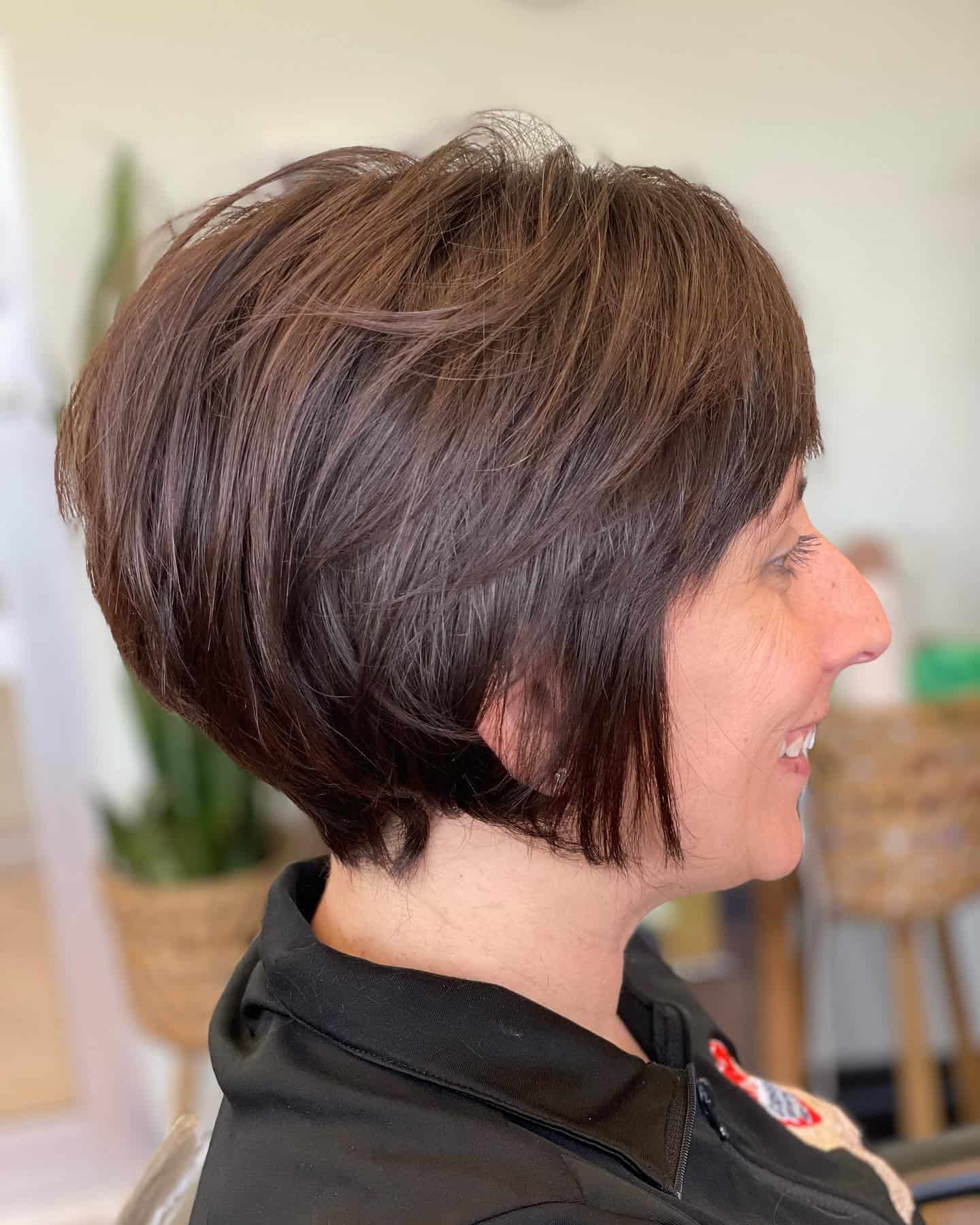 275336868_646417266580893_4805024234360940632_n Natural brown bixie with side-swept bangs