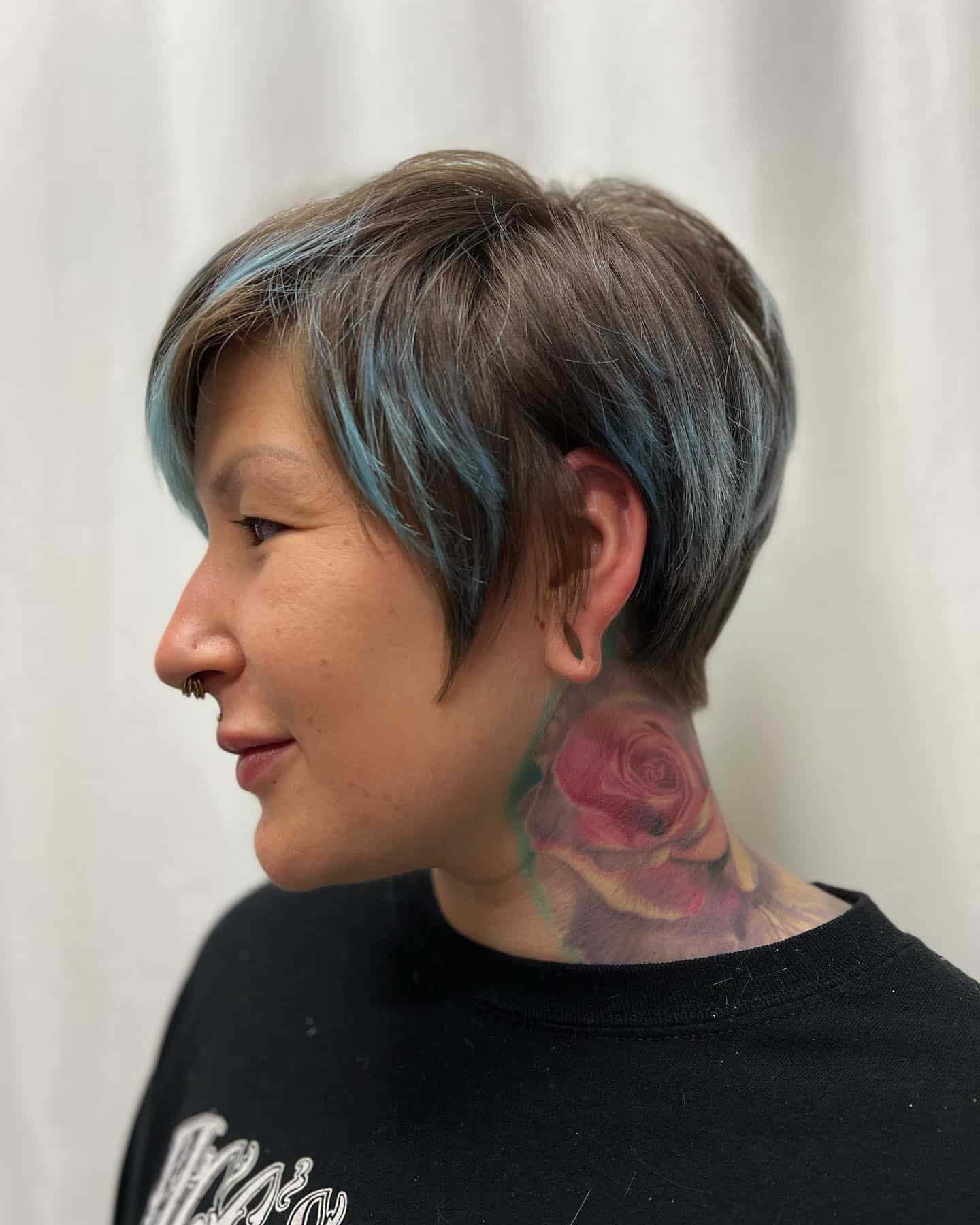 275928490_1026850274618777_1258578175386188603_n Bixie haircut with brown base and blue highlights