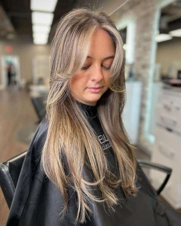 blonde-balayage-layered-butterfly-haircut-with-curtain-bangs Blonde Balayage Layered Butterfly Haircut with Curtain Bangs