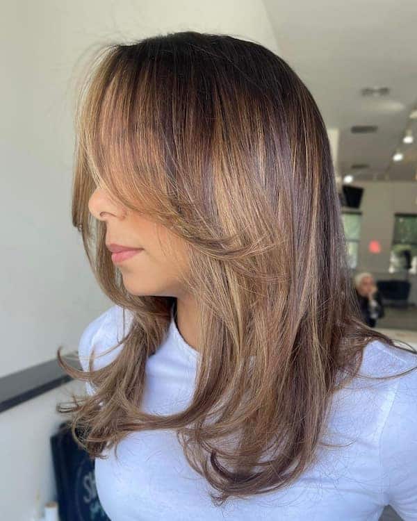 brunette-layered-haircut-with-feathered-curtain-bangs Brunette Layered Haircut with Feathered Curtain Bangs