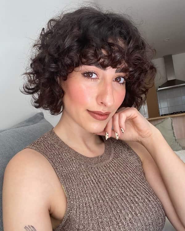 capped-curly-hair-with-bangs Capped Curly Hair with Bangs
