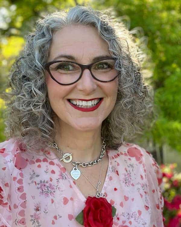center-parted-medium-length-gray-hair-with-curls Center-Parted Medium Length Gray Hair with Curls