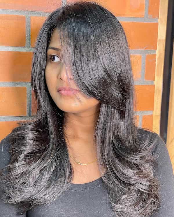cute-mid-length-haircut-with-feathered-layers-for-thick-hair Cute Mid-Length Haircut with Feathered Layers for Thick Hair