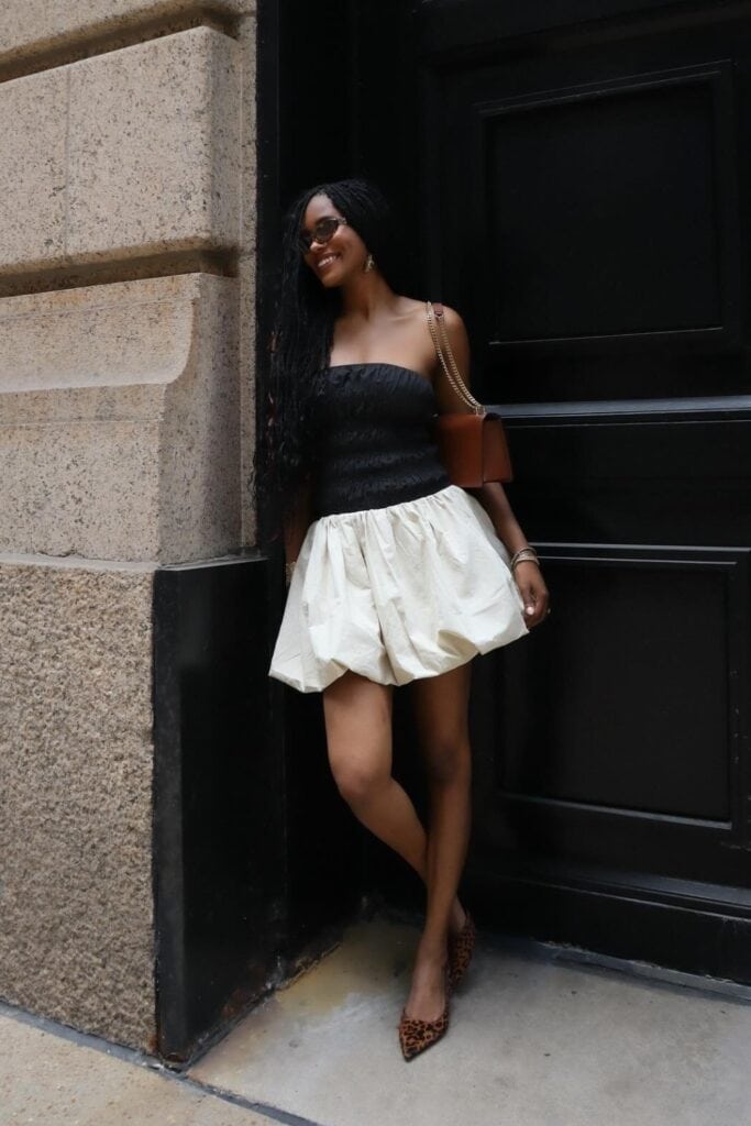 Black strapless top, white bubble mini skirt, and leopard print kitten heels