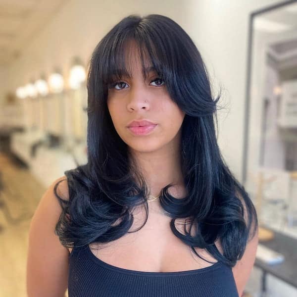 layered-haircut-with-wispy-bangs Layered Haircut with Wispy Bangs