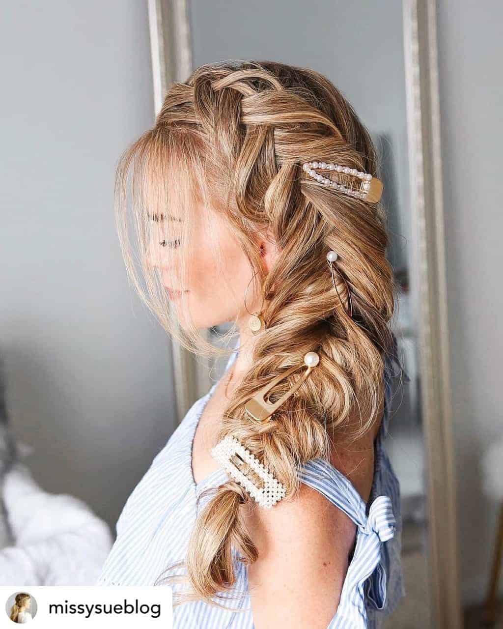 A chunky side fishtail is the perfect hairstyle for New Years Eve!