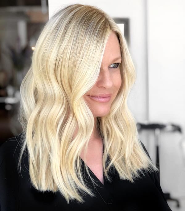 Pure Blonde Wavy Haircut