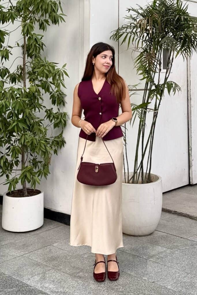 satin-skirt-outfits-24-683x1024-1 Burgundy Button-Up Vest & Cream Maxi Skirt