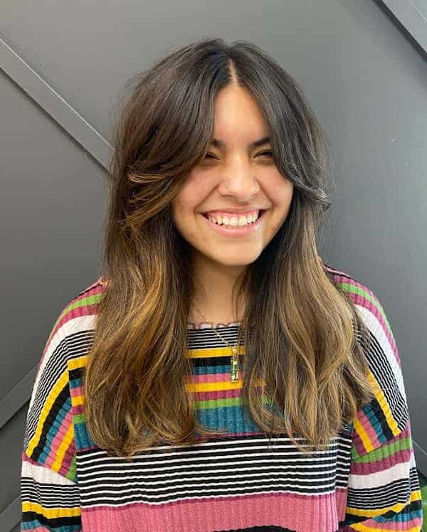 simple-layered-haircut-with-curtain-bangs
