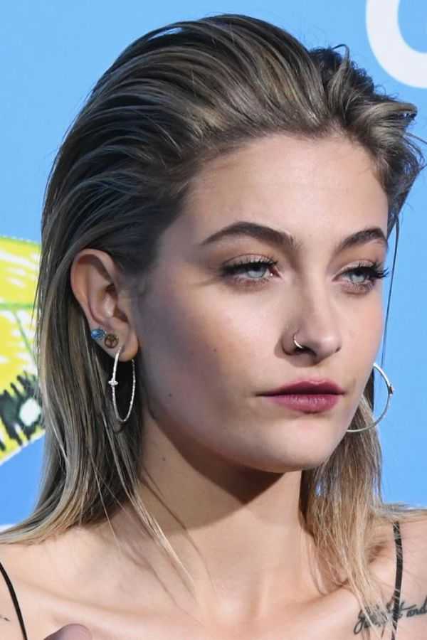 slicked-back-mid-length-style Slicked-Back Mid-Length Style