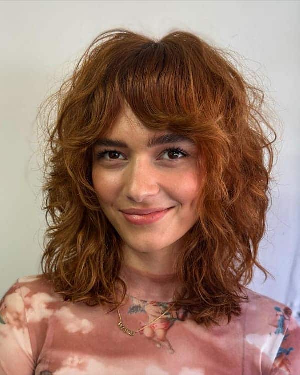 textured-feathered-bob-with-bangs Textured Feathered Bob with Bangs