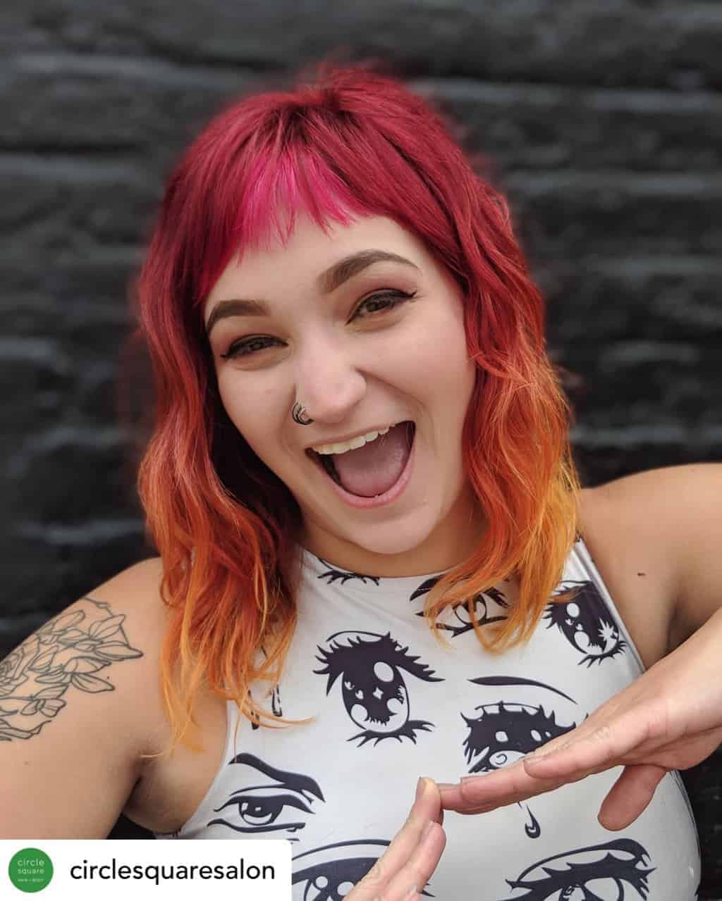 Baby bangs on beautiful red and orange hair.