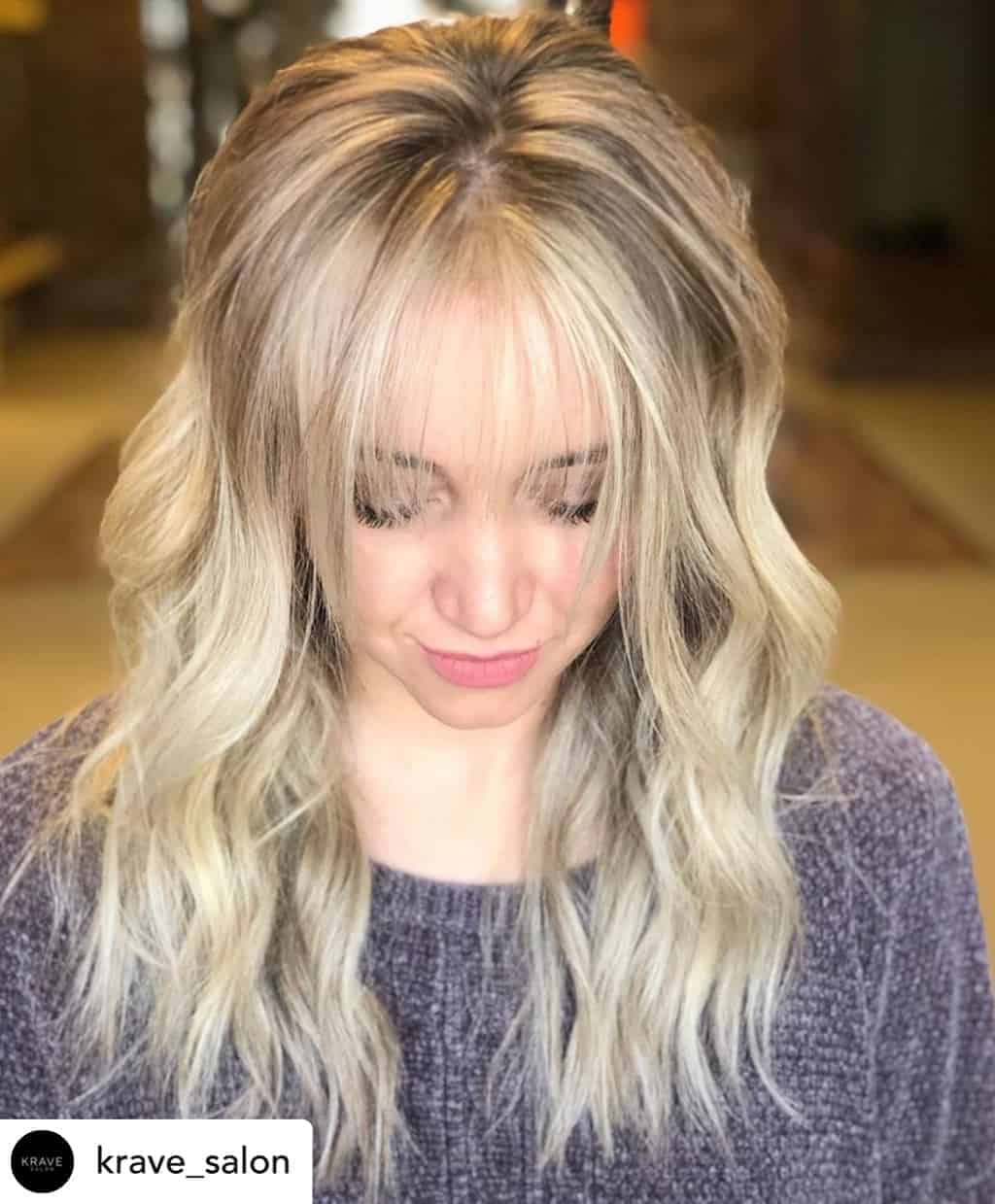 Wispy bangs on beautiful blonde hair.