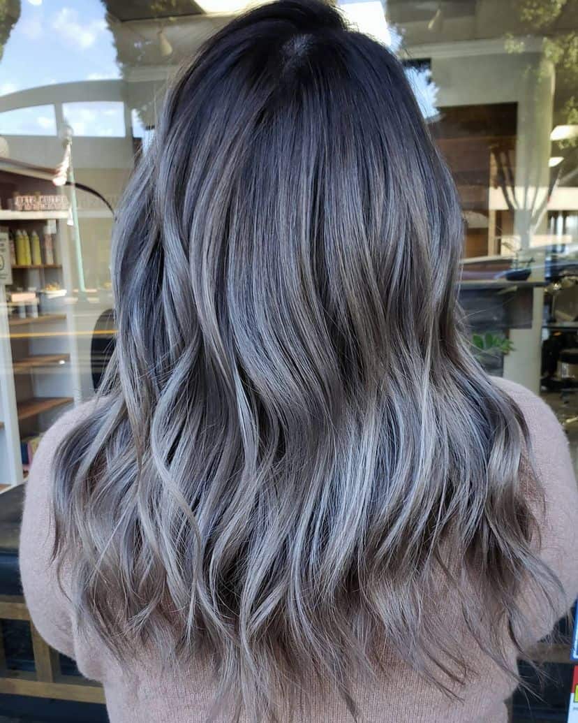 winter-hair-colors-10 Woman with gorgeous smokey ash brown hair color for winter.