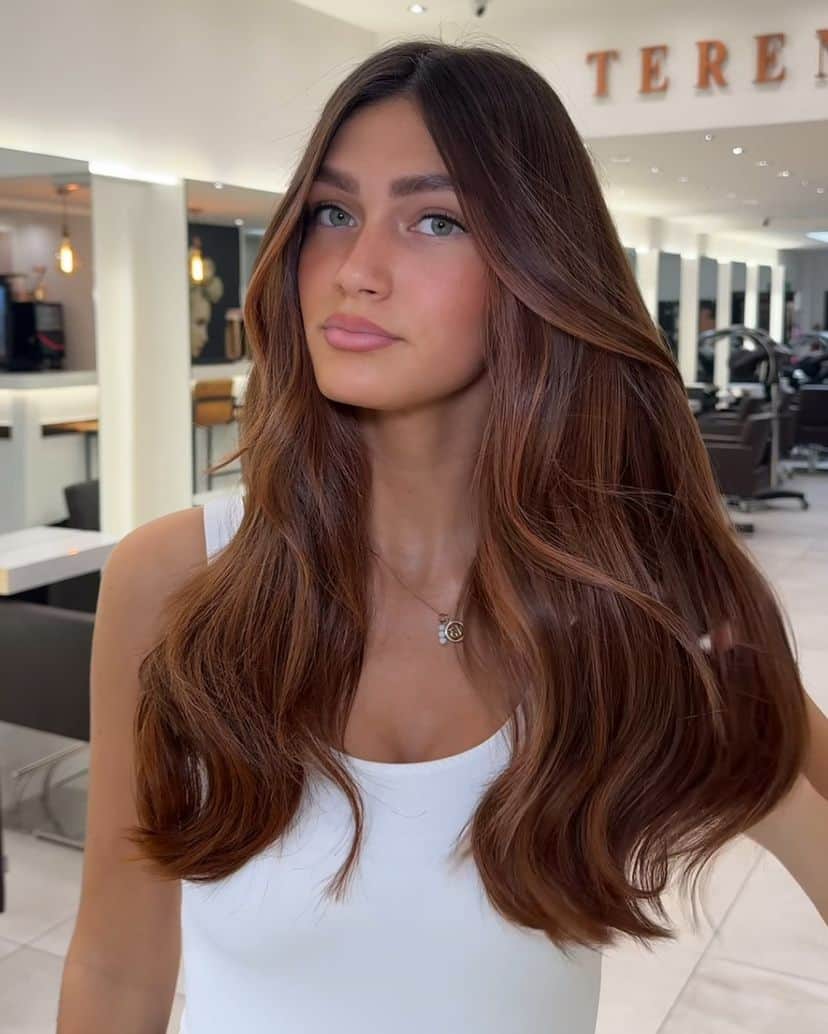 winter-hair-colors-2 Woman with gorgeous cinnamon brown spice hair color for winter.